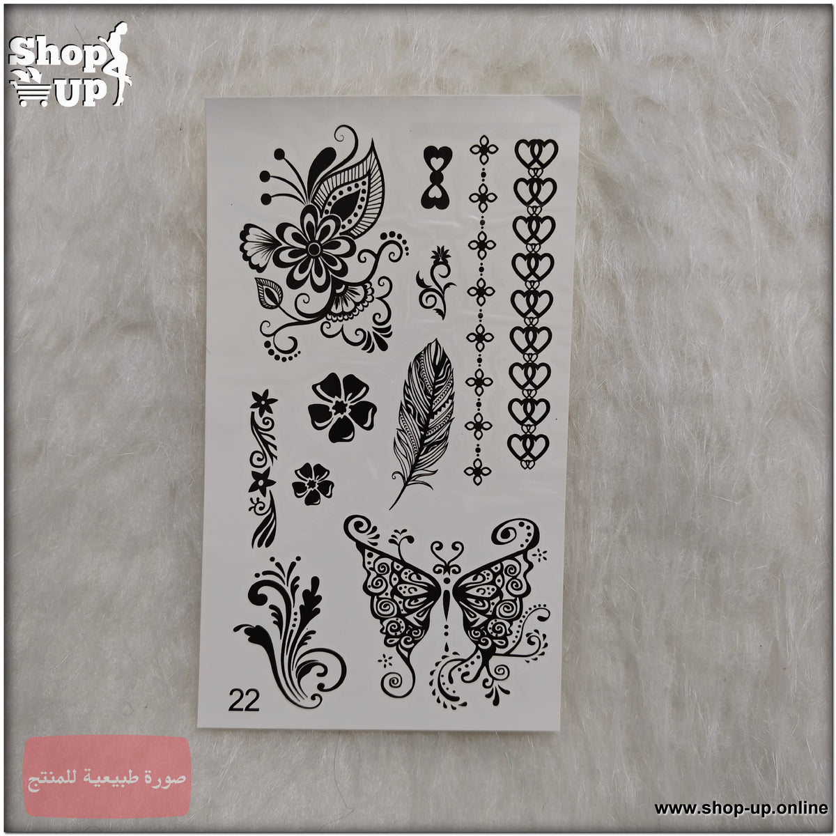 شيت تاتو مؤقت يحتوي على رسومات فراشة وزهور وريشة باللون الأسود.